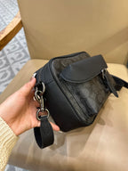 Bolsa Transversal Coach Warner em Canvas Signature Black