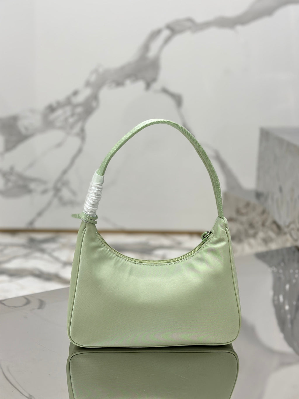 Bolsa Prada mini Re-Edition 2000