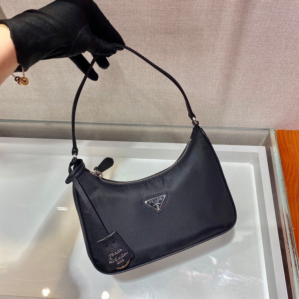 Bolsa Prada mini Re-Edition 2000