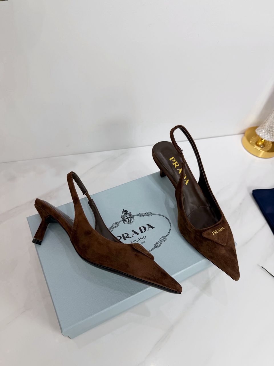 Prada dark brown suede slingback pump from