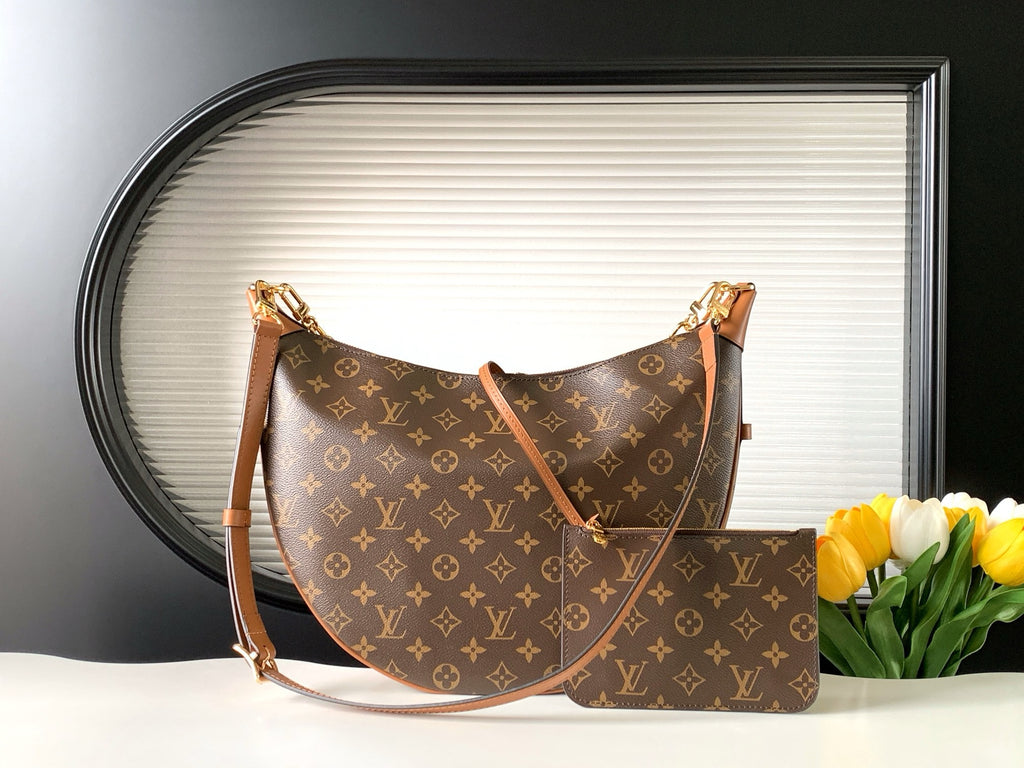 Bolsa Hobo Loop Monogram Louis Vuitton.