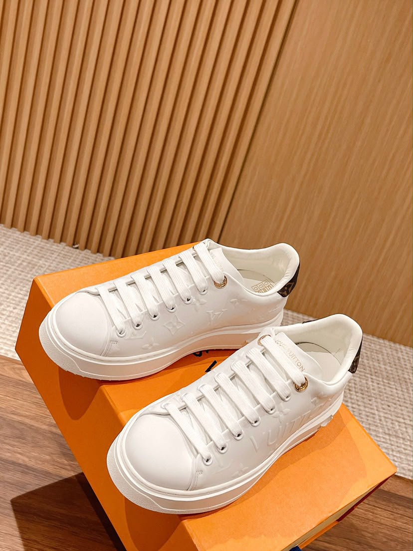LV Time Out Debossed Monogram Signature White