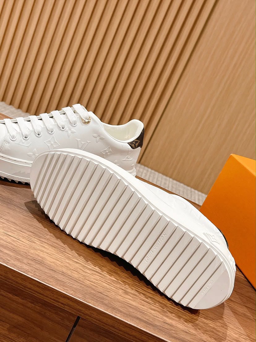 LV Time Out Debossed Monogram Signature White